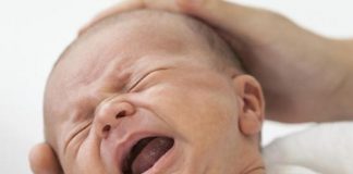 signs and treatments of acid reflux in infants