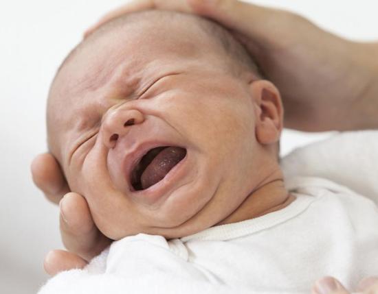 signs and treatments of acid reflux in infants